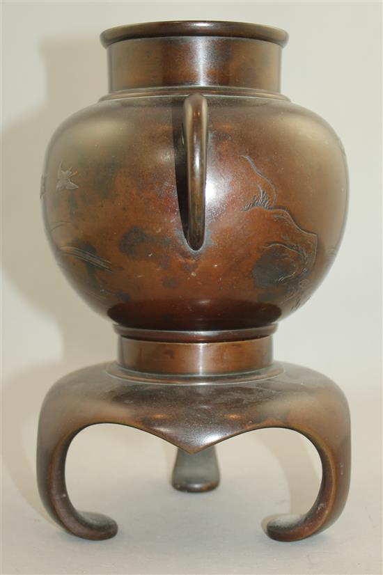 A Japanese inlaid bronze two handled vase and stand, Meiji period, 26cm